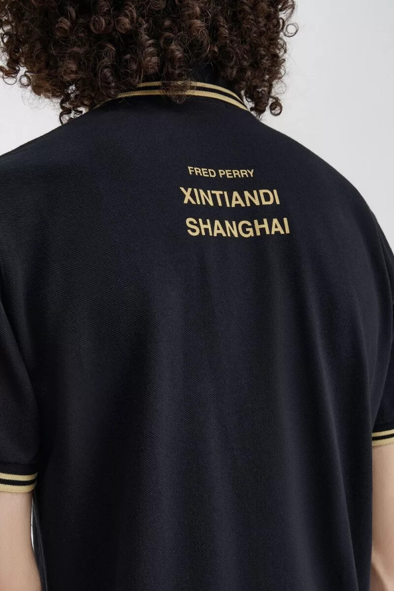 fred perry shanghai m12 herren-poloshirt schwarz champagner
