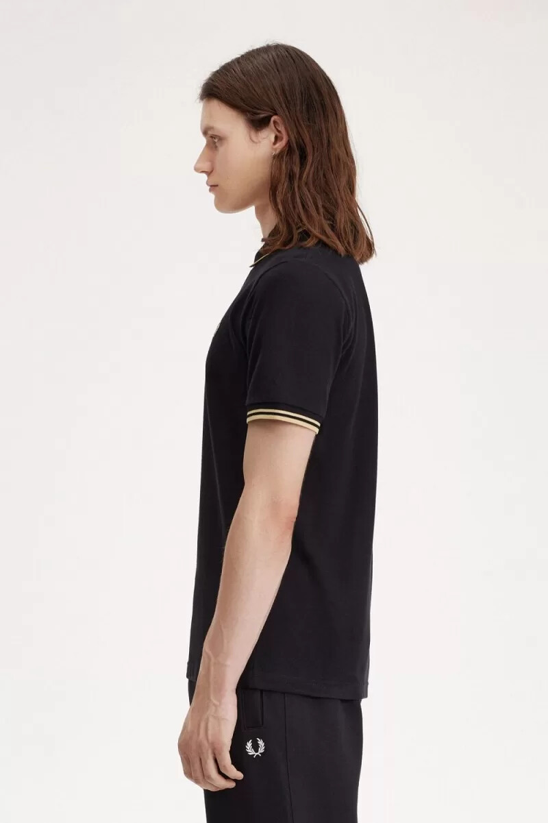 fred perry osaka m12 herren-poloshirt schwarz champagner