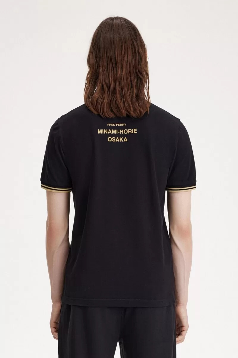 fred perry osaka m12 herren-poloshirt schwarz champagner