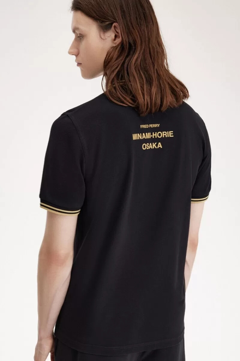 fred perry osaka m12 herren-poloshirt schwarz champagner