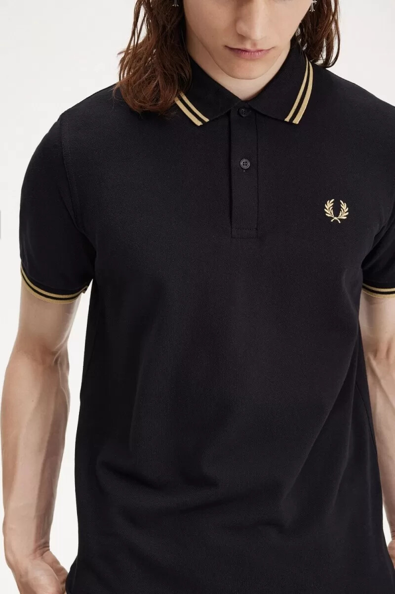 fred perry osaka m12 herren-poloshirt schwarz champagner